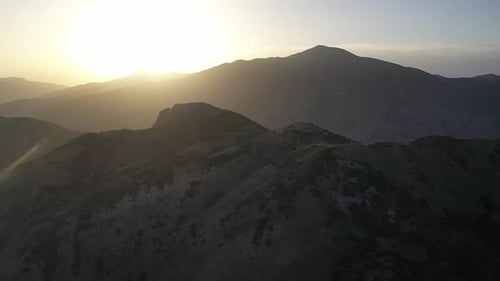 Aerial View Of The Sun Behind The Mountains At Sunrise