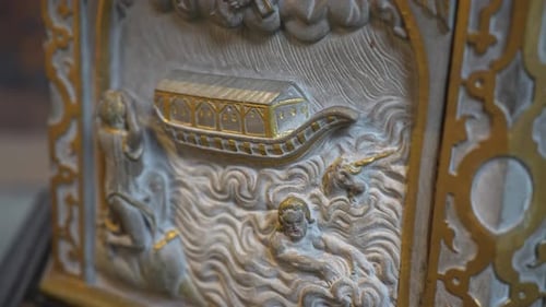 the biblical flood and Noah's Ark depicted on a stone Romania carving