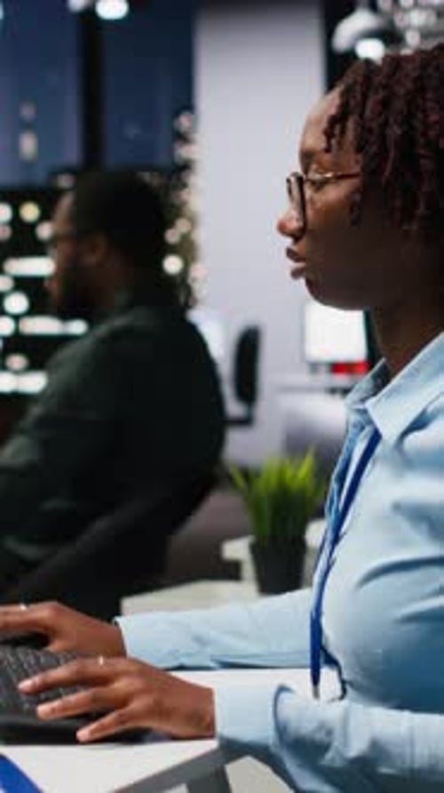 Vertical Video Professional Analyst Reviewing KPI Reports with Artificial Intelligence Tools