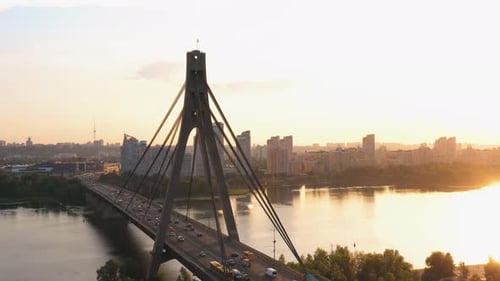 Urban Scape with a Huge River Bridge with Car Traffic