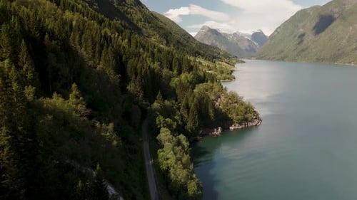 Breathtaking Aerial View of Serene Norwegian Fjord Surrounded By Lush Mountains
