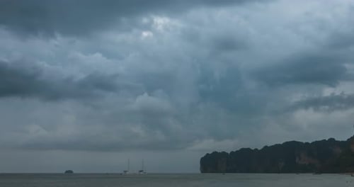 Time Lapse of Rain Clouds Over Beach and Sea Landscape with Boats