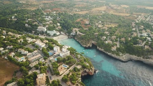 Stunning drone footage in 4k of the beautiful bay Cala Santanyi in Mallorca - East Coast - Empty wit