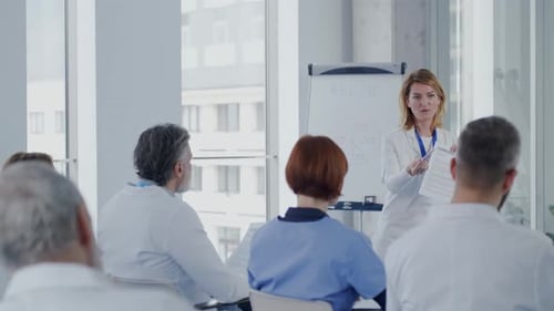 Medical professionals gather for a meeting