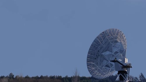 Satellite Dish Against a Light Blue Sky