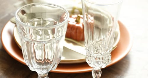 Beautiful table setting with autumn decor on wooden background, closeup
