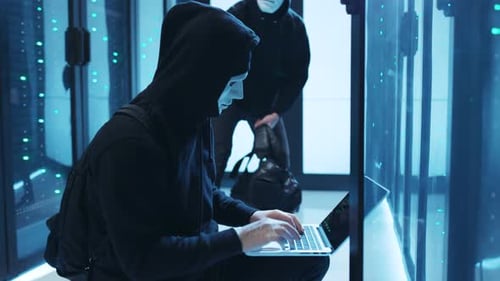 A Cyber Intruder is Operating in a Data Center While Keeping Their Identity Concealed Behind a Mask
