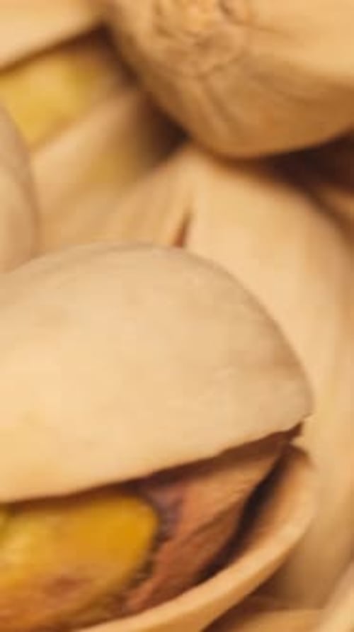Rotating Background Bunch of Pistachio Nuts Ready to Eat As Food Closeup Pistachio Texture