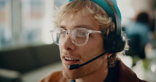 Businessman, consultant and discussion with headset in call center office for online advice