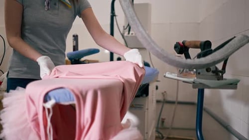 Steaming Delicate Garment on Industrial Iron Press