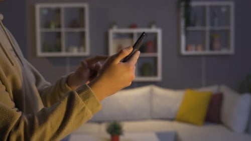 Using Mobile Phone at Home in Evening