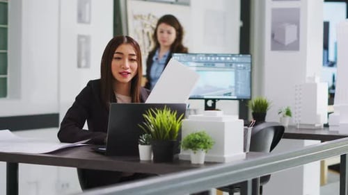 Developer on Videocall with Specialist to Confirm Proper Features