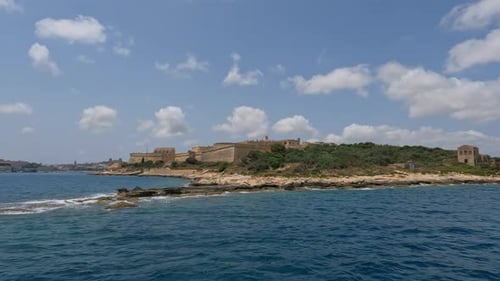Off the coast of Malta, Valletta overlooking pier with historical building