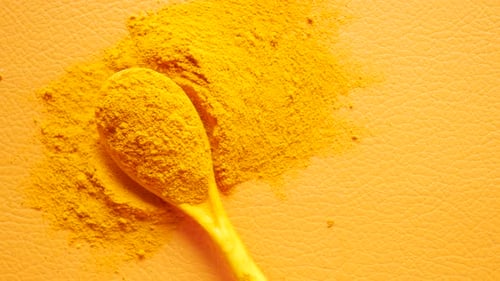 Turmeric Root Powder on Spoon