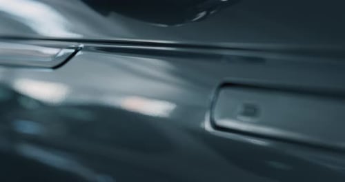 Close up of young businessman hand opening an anonymous car just bought from auto deal. Slow motio