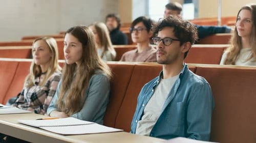 In the University Lecture Hall Multi Ethnic Group of Students Listening Attentively. Auditorium Ful