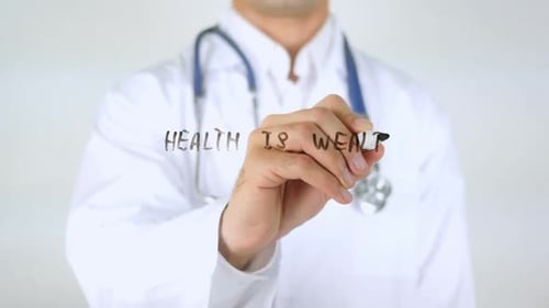 Doctor Writes 'Health is Wealth' on Clear Surface