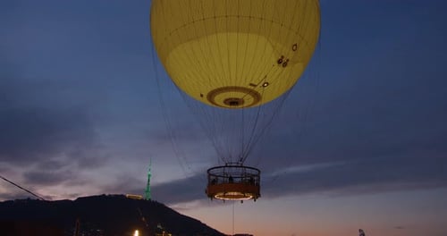 Hot Air Balloon Floating in the Twilight Sky