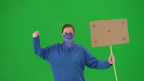 Woman with Bandana Holds Sign on Green Screen