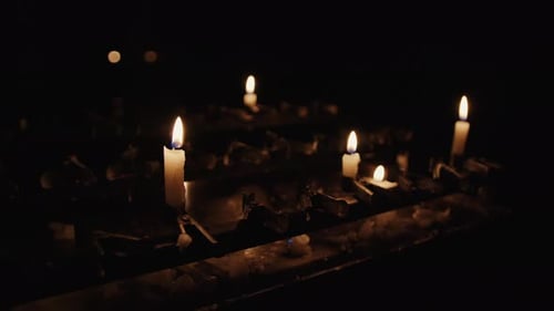 Candles Burning in the Darkness