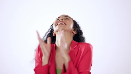 Celebration, fist and happy woman in studio with good news, promotion or bonus on white background