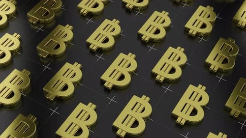 Goldene Bitcoin-Währungssymbole auf dunklem Hintergrund