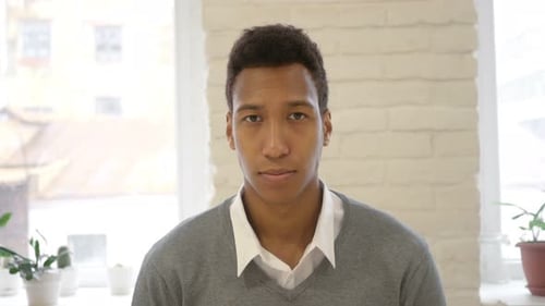 Young Adult Portrait in Bright Indoor Setting