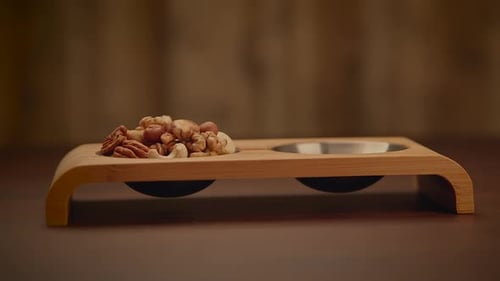 Mixed Nuts of Almonds Pecan Walnuts Cashews Hazelnuts on Wooden Table