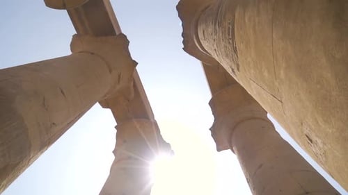 Detail of natural light on the ancient egyptian patterned columns inside the Luxor Temple, Egypt