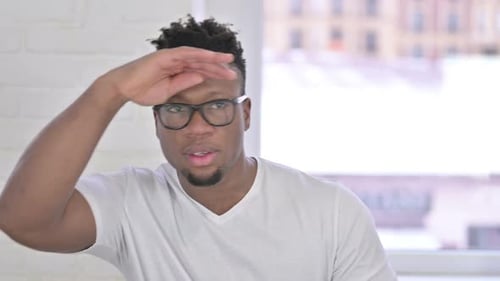 Portrait of Casual African Man Searching for Opportunity