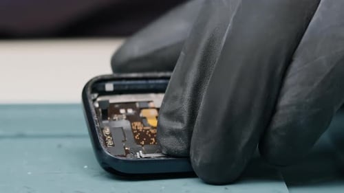 smart watch being repaired by an engineer Workshop for the repair of phones and equipment