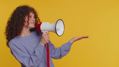 Woman Talking with Megaphone Proclaiming News Loudly Announcing Advertisement Pointing Empty Place