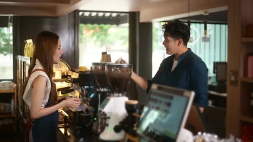 Angry customer complaining about barista in coffee shop