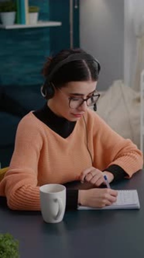 Vertical Video University Student Listening to Online School Class on Laptop