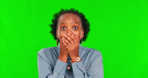 Black woman, surprise and face on green screen, emoji and shocked reaction to announcement on studio