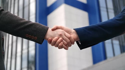 Two Business Man Colleagues Partner Handshaking Greeting Deal Partnership Downtown Office Closeup