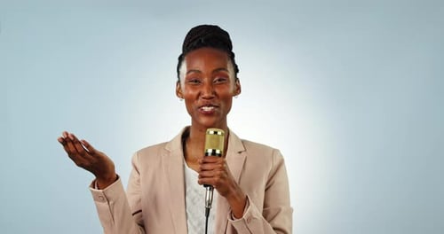 Microphone, wave and a black woman reporter on a blue background in studio for a broadcast