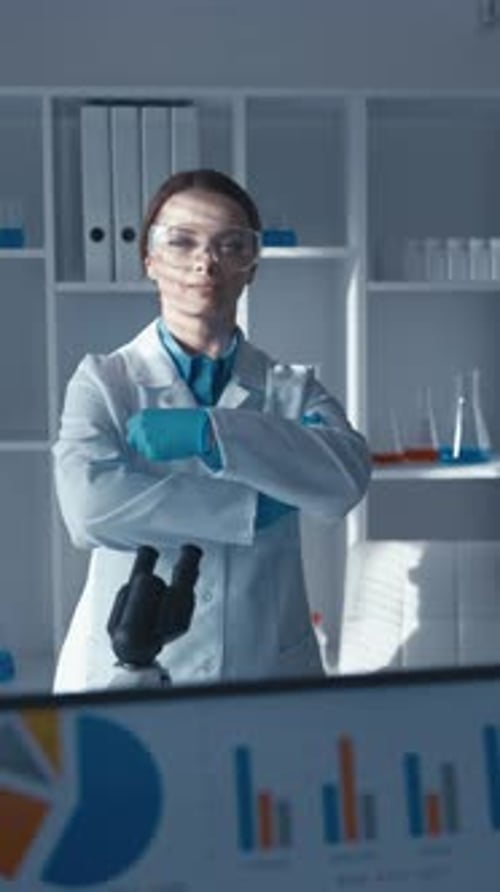 In This Vertical Video the Doctor in Her Office Gracefully Poses for the Camera Conveying Confidence