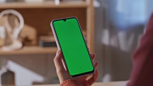 Hand Swiping on Phone with Green Screen