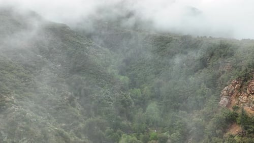 Aerial of fog covered mountains in Southern California.