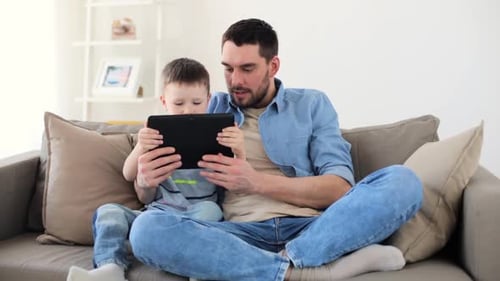 Father and Son Bonding Time with Tablet