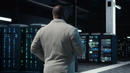 Software Developer in Data Center Using Tablet Employing Machine Learning