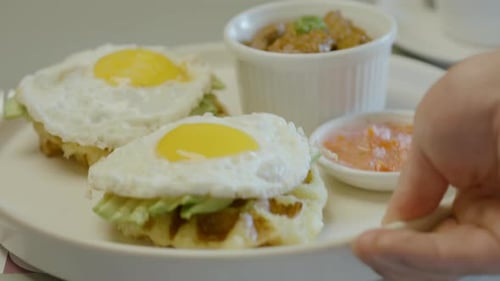 Waffles with Fried Egg Breakfast Meal on Plate