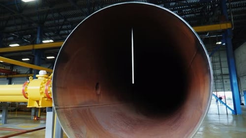 Motion Out of Metal Pipe in Gas and Oil Refinery Workshop