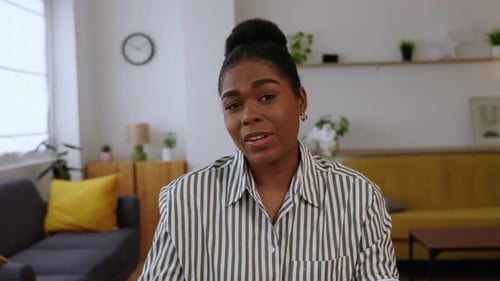 Young Adult Woman Talking Indoors