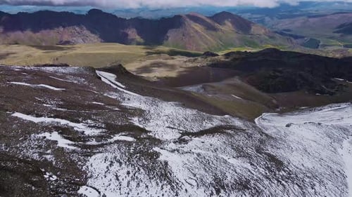 Aerial View of a Snowcovered Mountain in a Natural Landscape