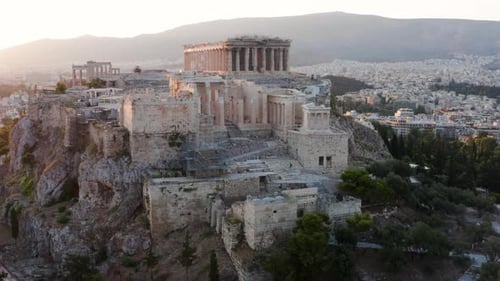 Aerial View Of Historic And Iconic Acropolis of Athens During Sunrise In Greece.