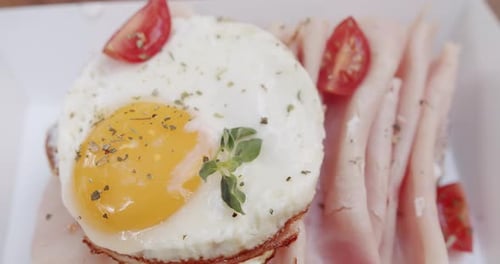 Fried Egg with Ham and Toast for Breakfast