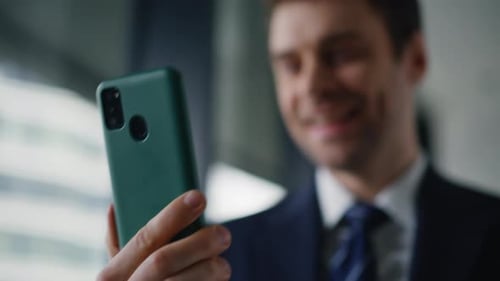 Joyful Ceo Reading Cellphone Message Standing Modern Office Interior Closeup