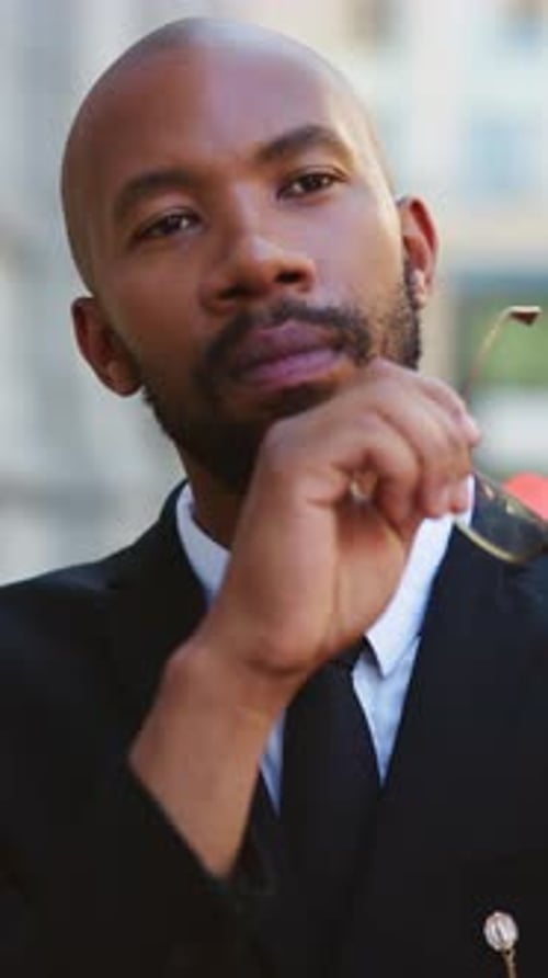 Lawyer, glasses and black man in city, decision for court case results and reflection